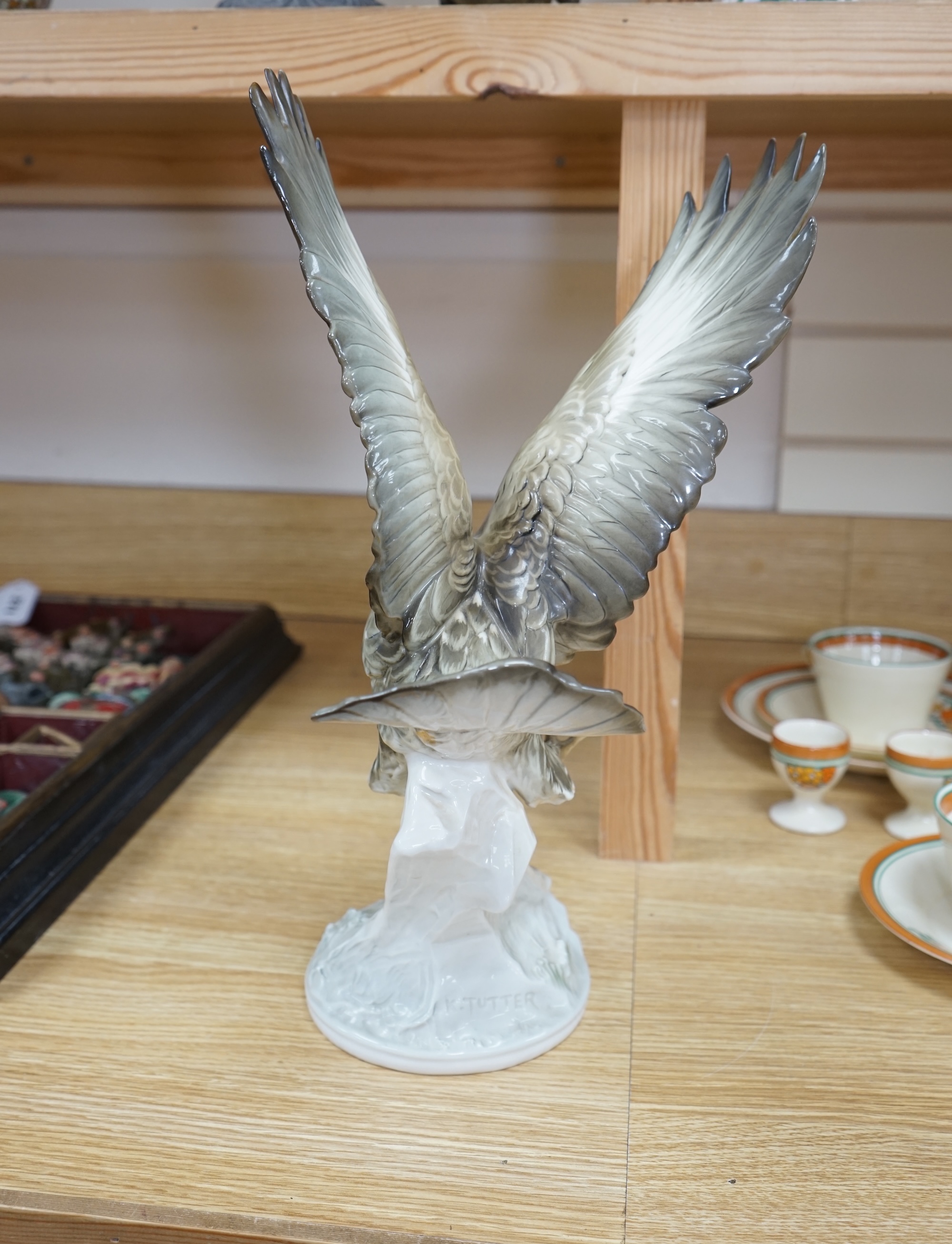 Karl Tutter (1883-1969) for Kutschenreuther, a porcelain model of a hawk, 42cm. Condition - restoration? otherwise good